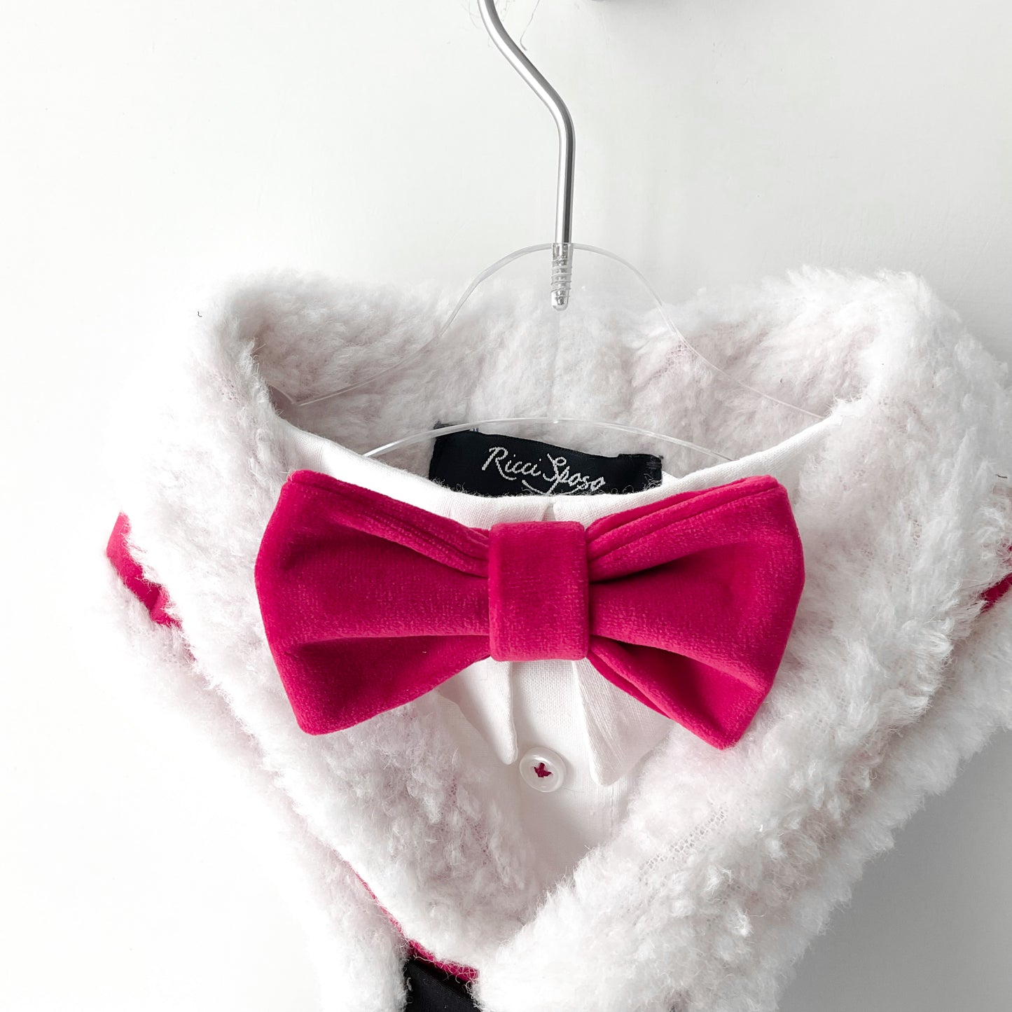 Christmas dog tuxedo with red bow tie and white collar