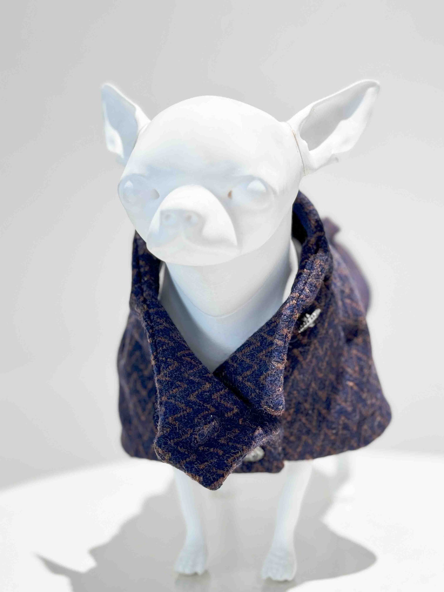 Stylish dogs in sweaters: Custom wool coat with herringbone pattern and sparkling jewel buttons.