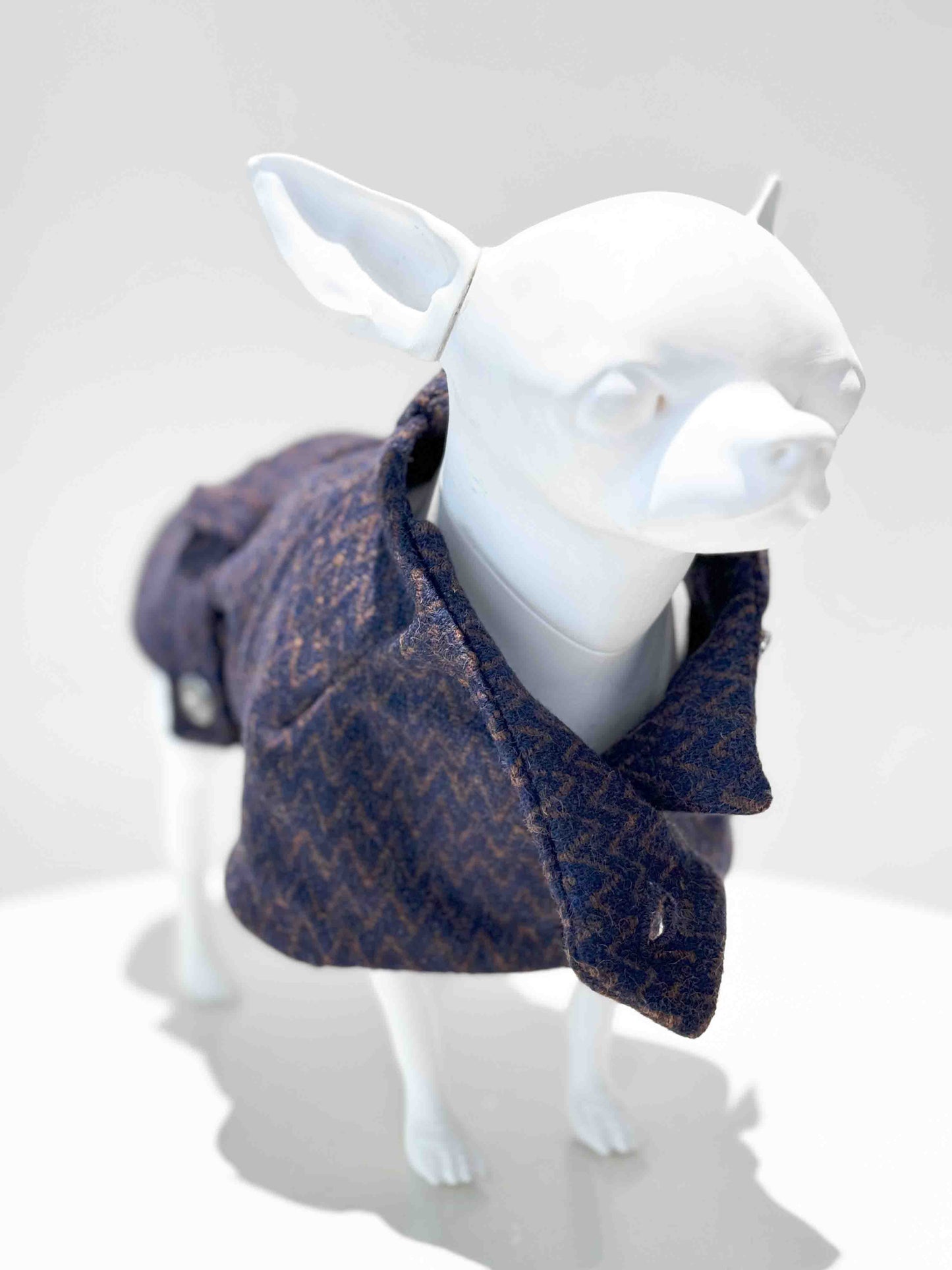 Tailored dress for a dog: Sophisticated wool winter coat designed for warmth and elegance.