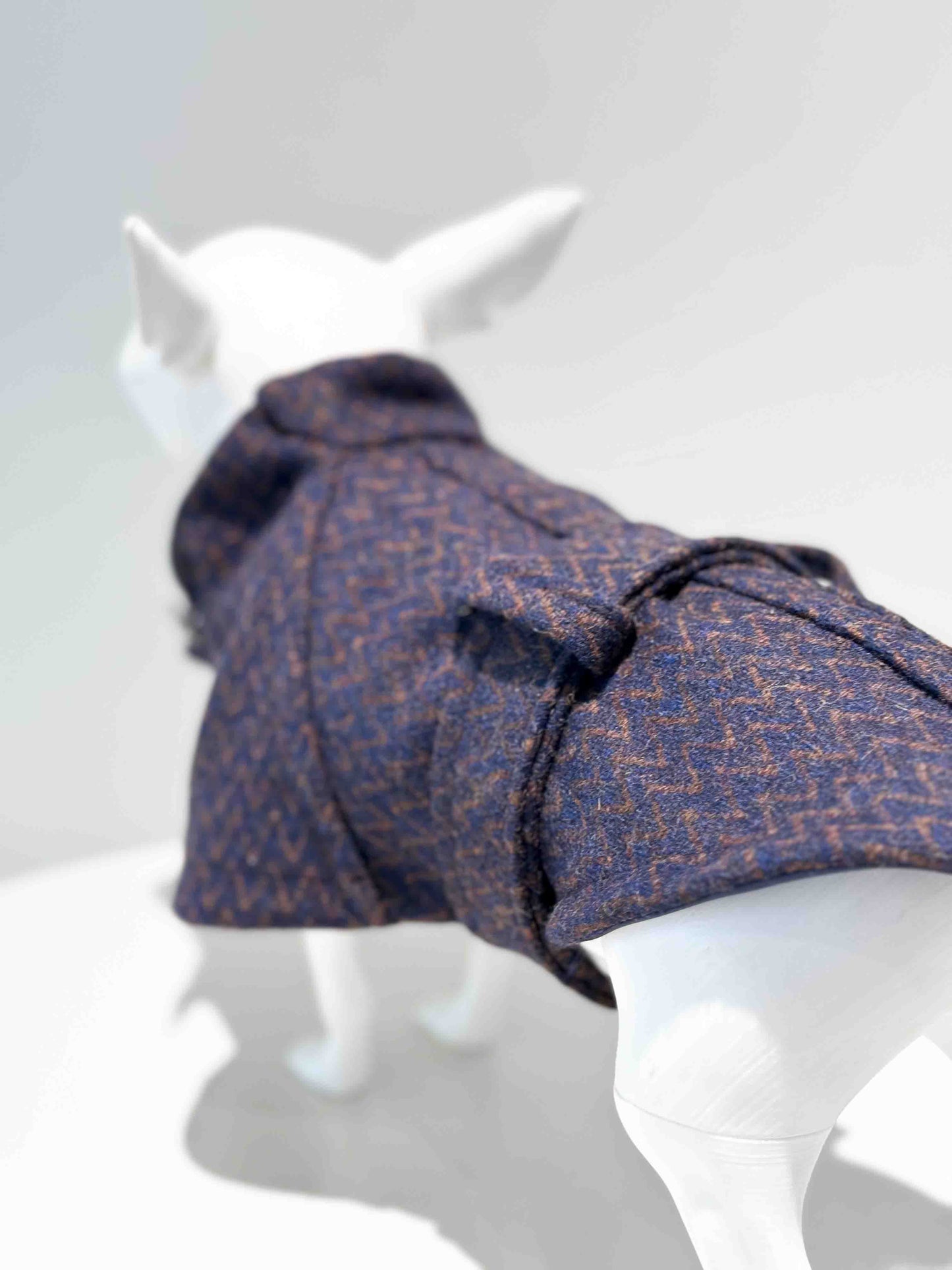 Herringbone-pattern dress for a dog: Luxurious wool coat with sparkling button accents.