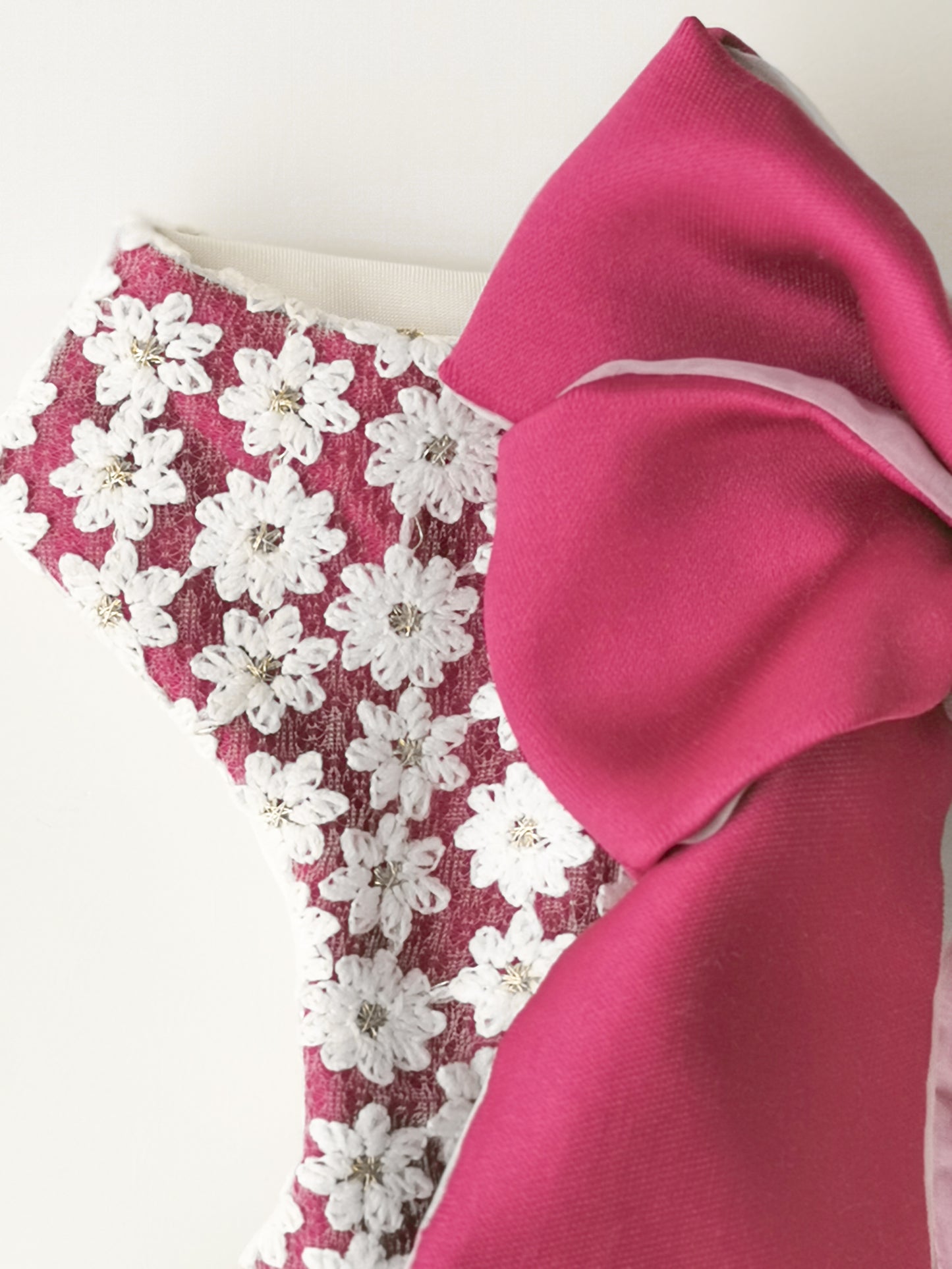 fabric with embroidered flowers and red bow perfect for sunny days